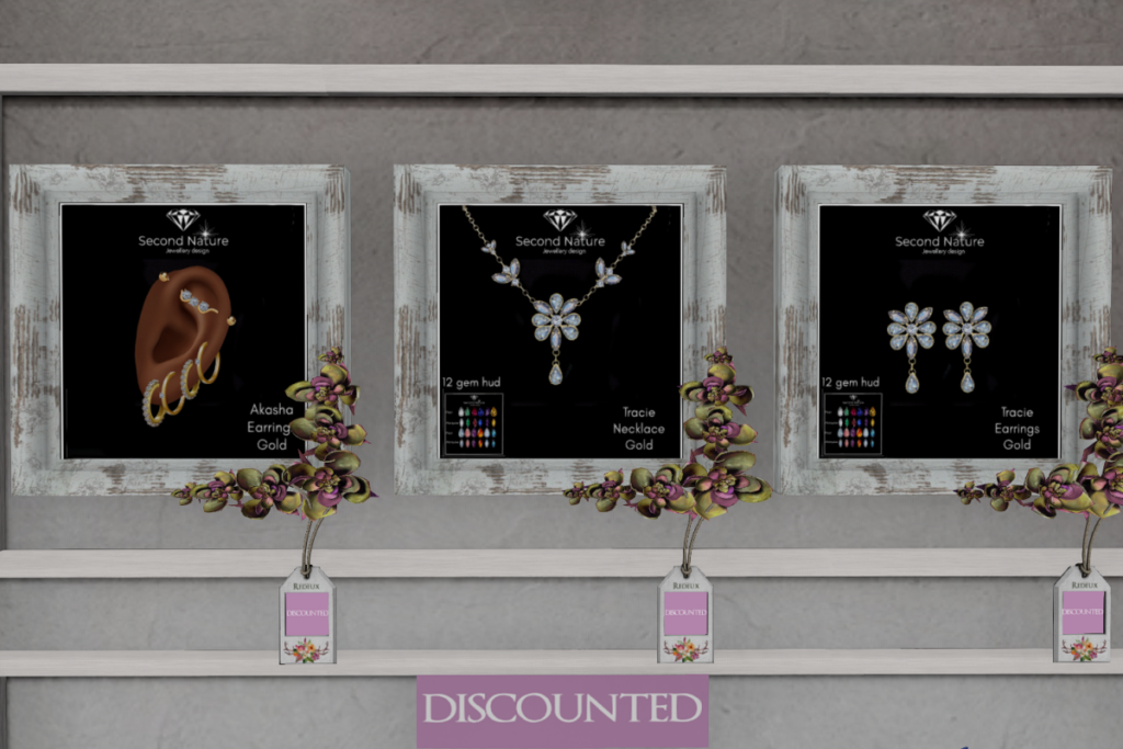 Akasha Gold Earring, L$175 | Tracie Gold Necklace, L$207 | Tracie Gold Earrings, L$137